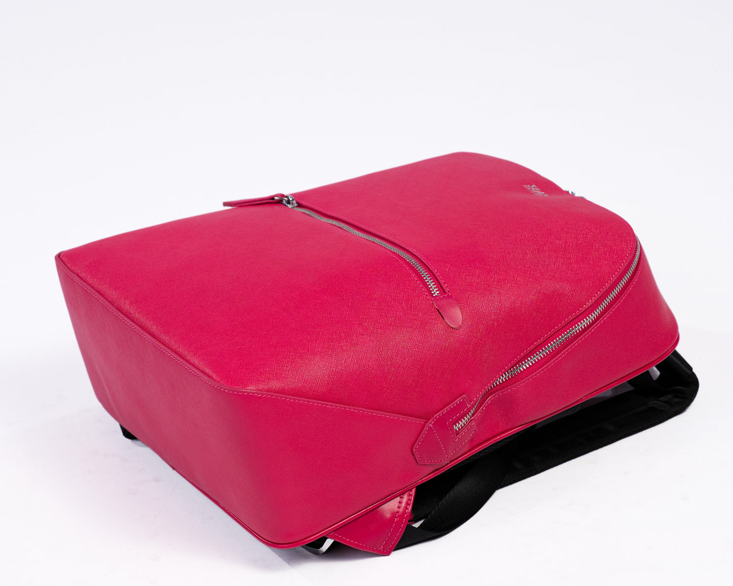 Pink backpack on a white background