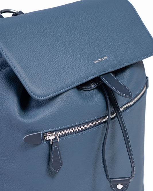 Blue backpack with a visible brand logo on a white background