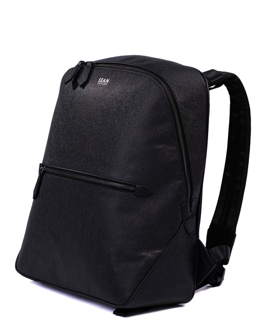 Black backpack on a white background