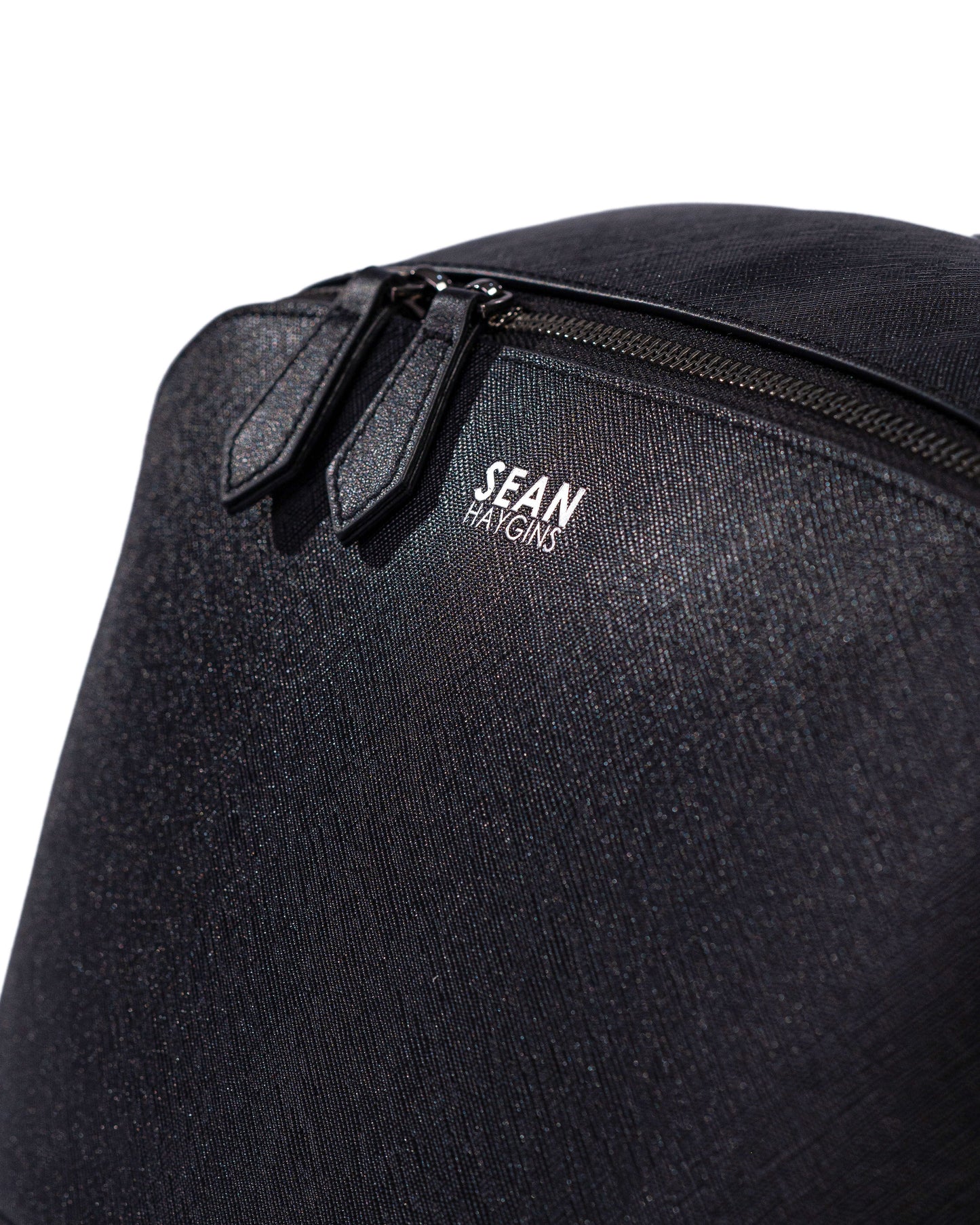 Black backpack with 'Sean' logo on a white background