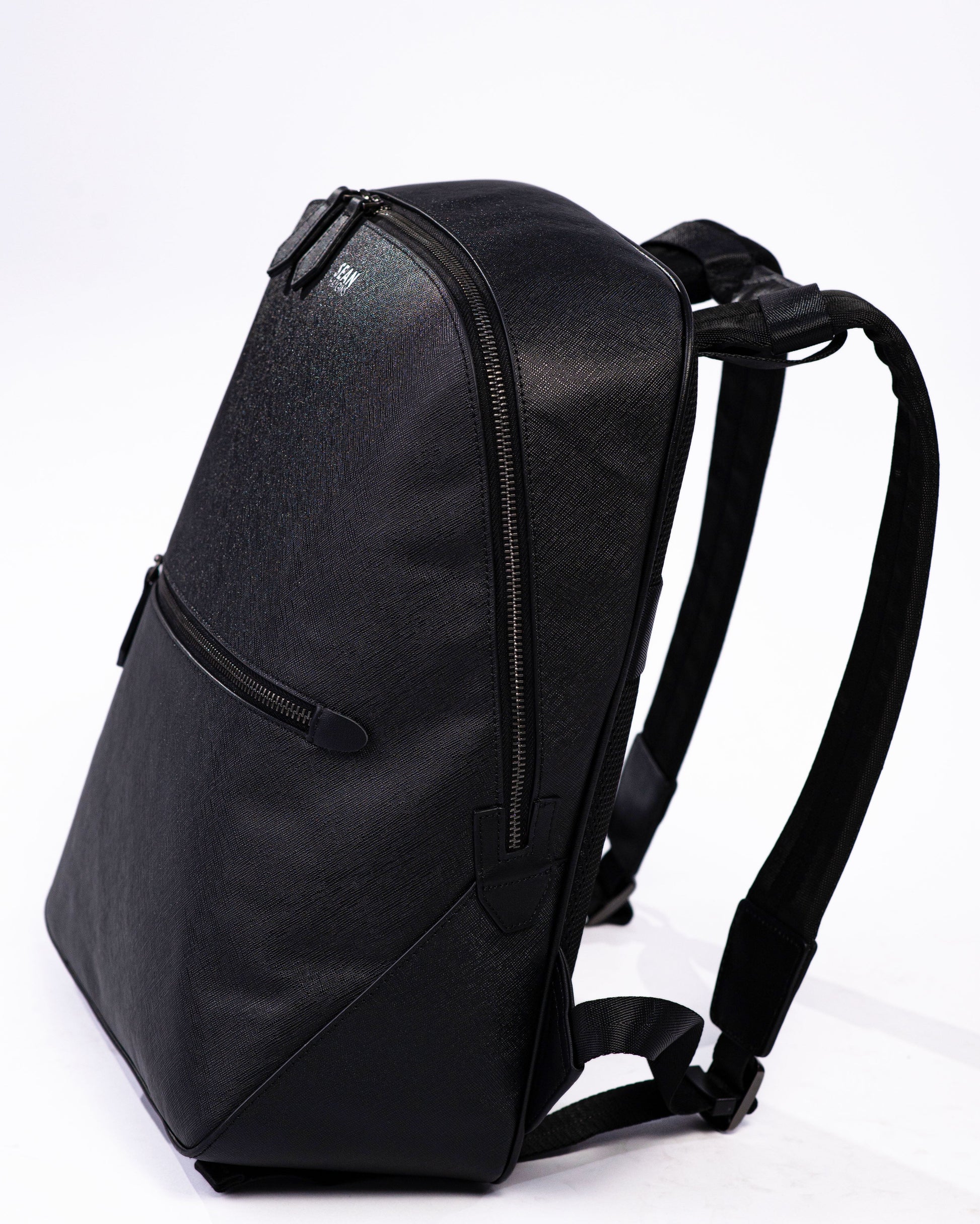 Black backpack on a white background