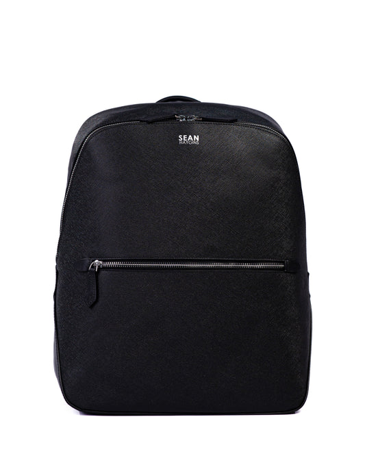 Black backpack with a visible brand name on a white background
