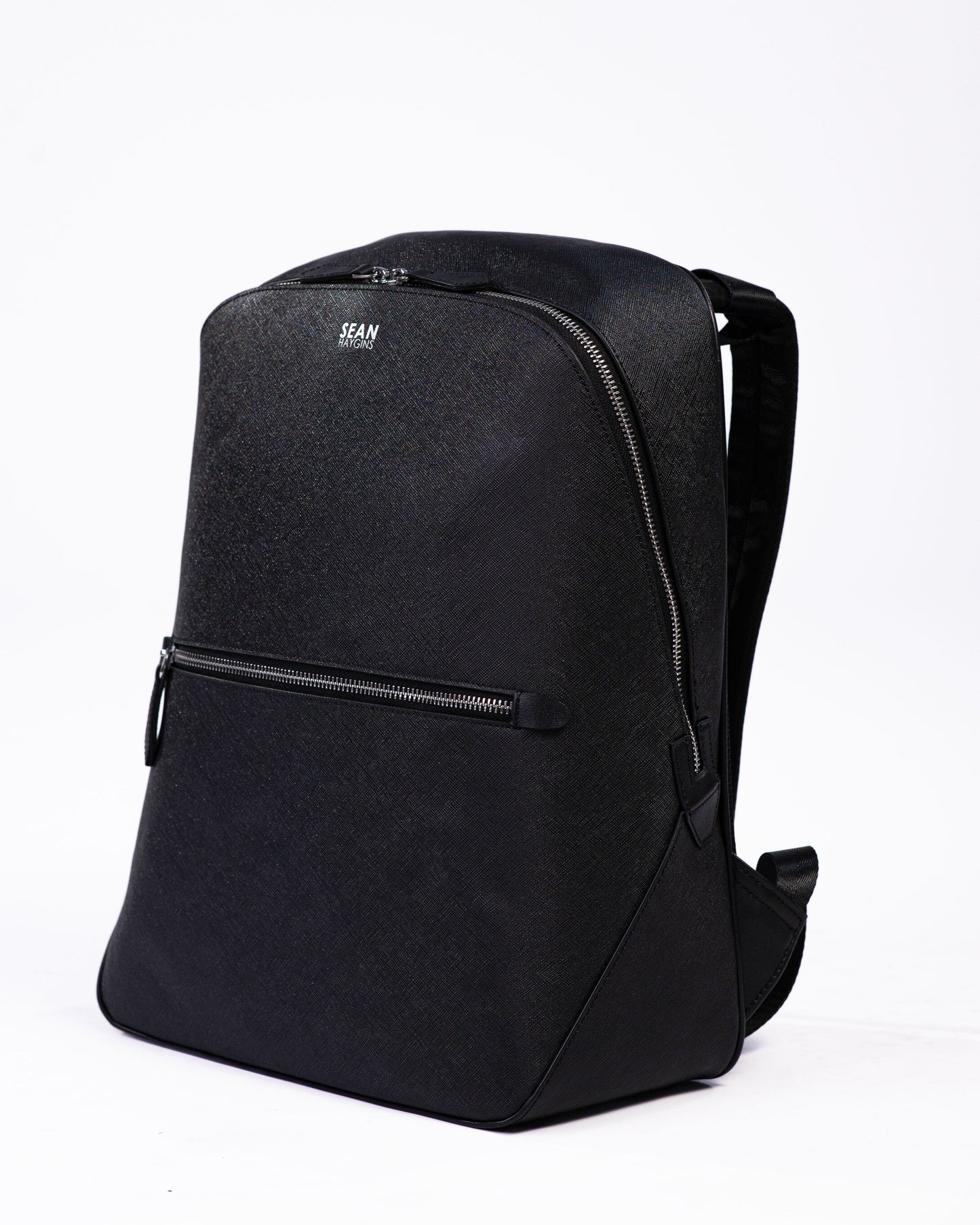 Black backpack on a white background