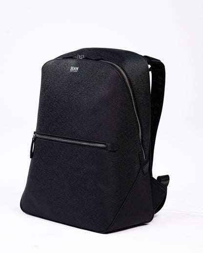 Black backpack on a white background