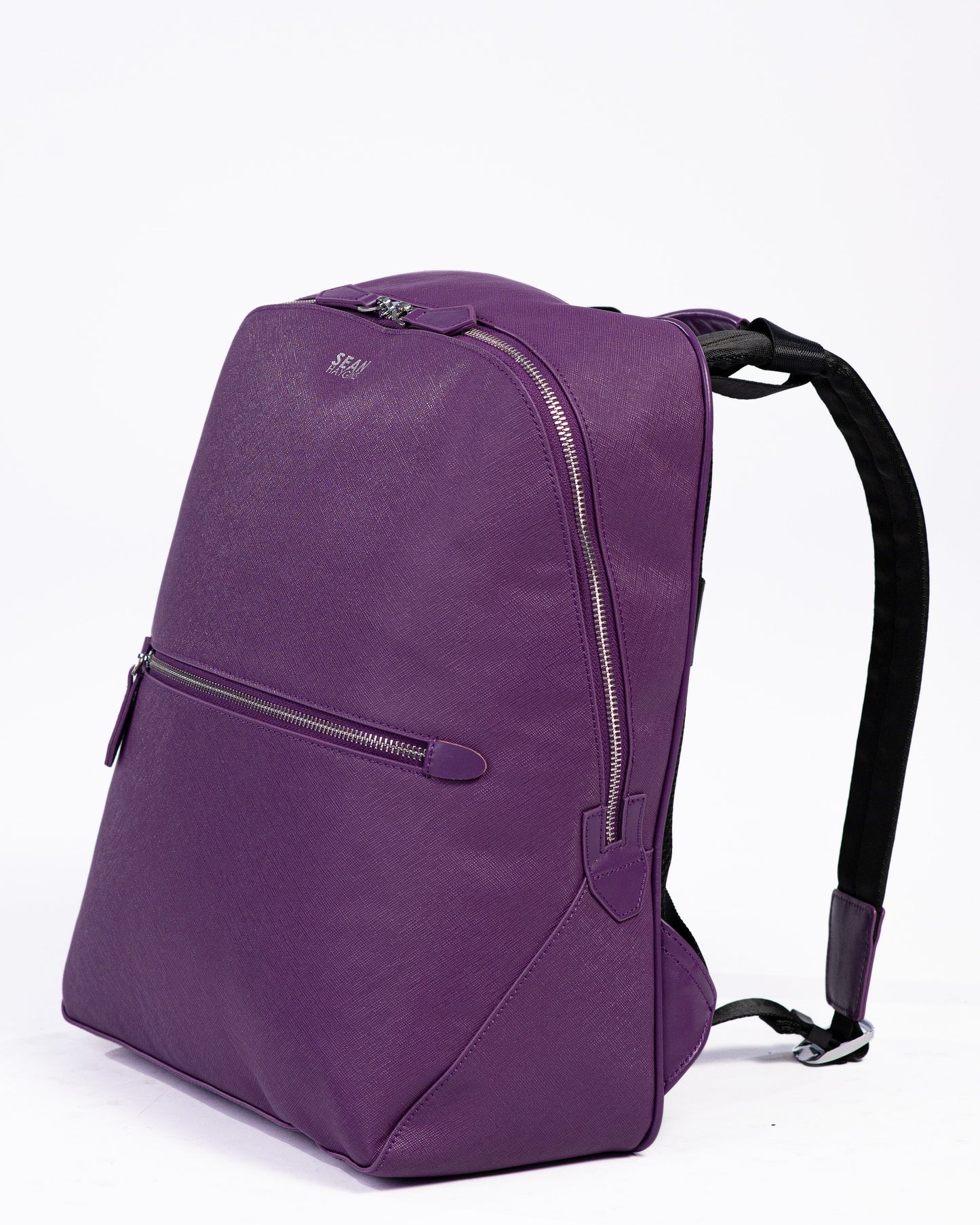 Purple backpack on a white background