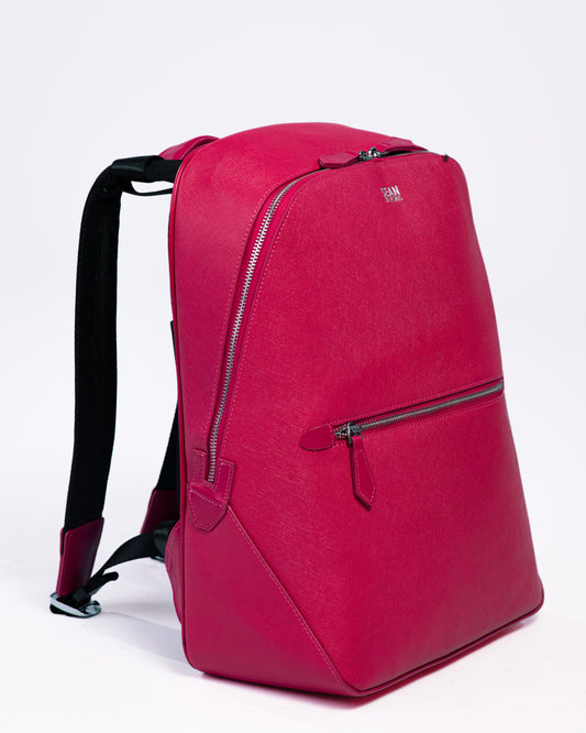 Red backpack on a white background