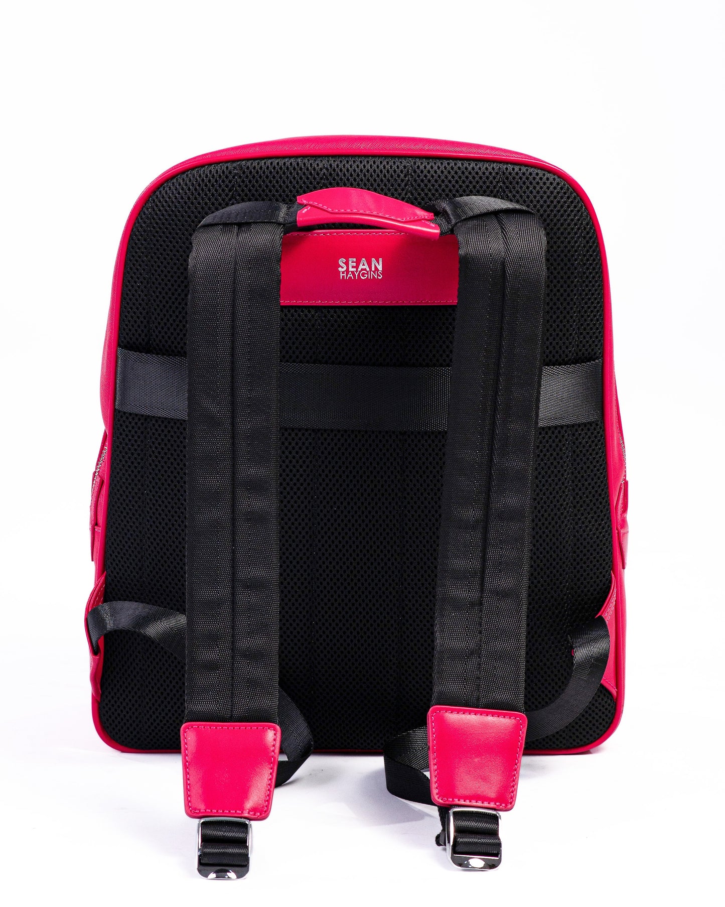 Backpack with pink straps on a white background