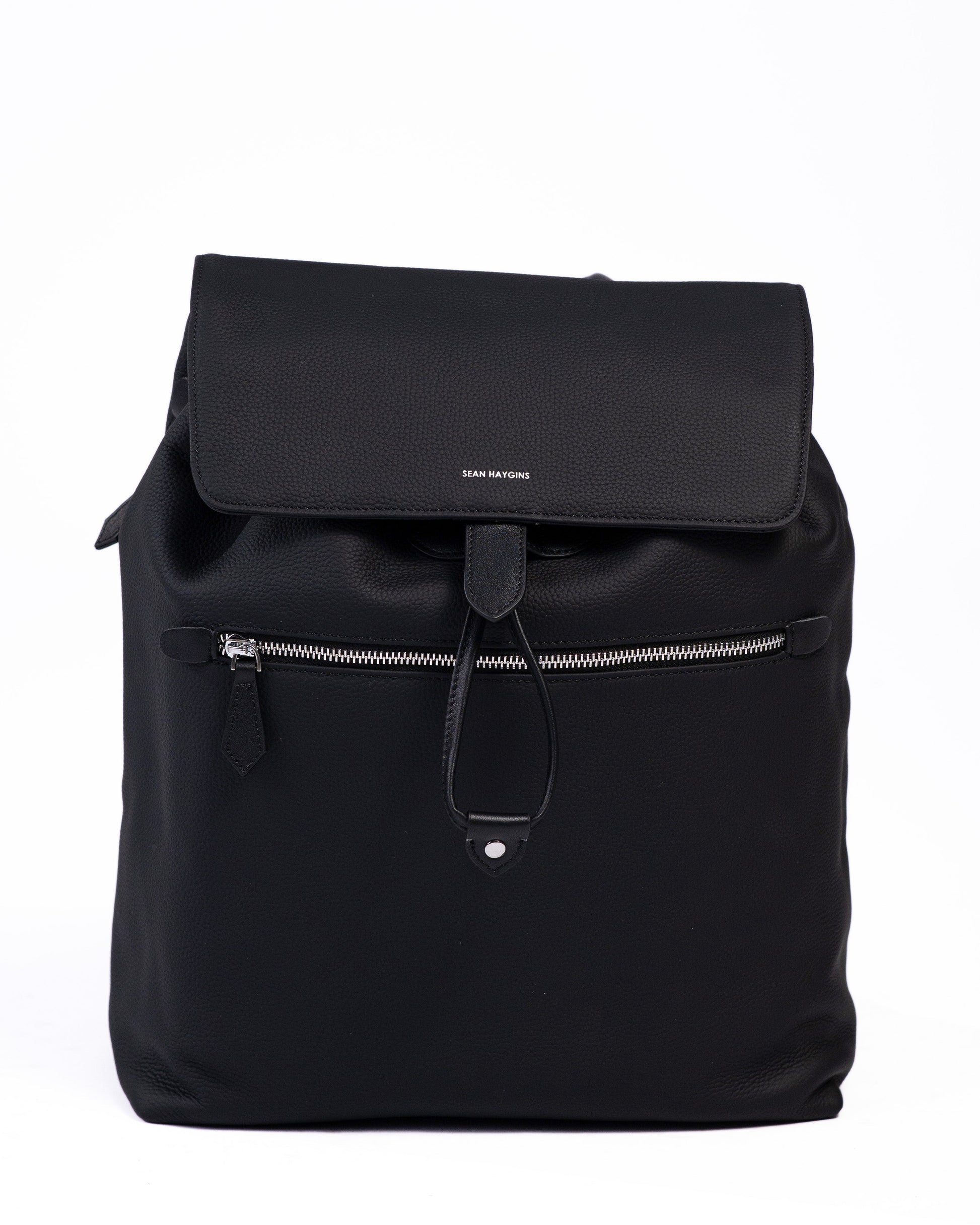 Black backpack on a white background