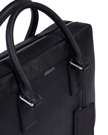 Black handbag with 'Aristache' branding on a white background
