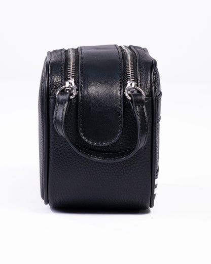 Black leather camera case on a white background