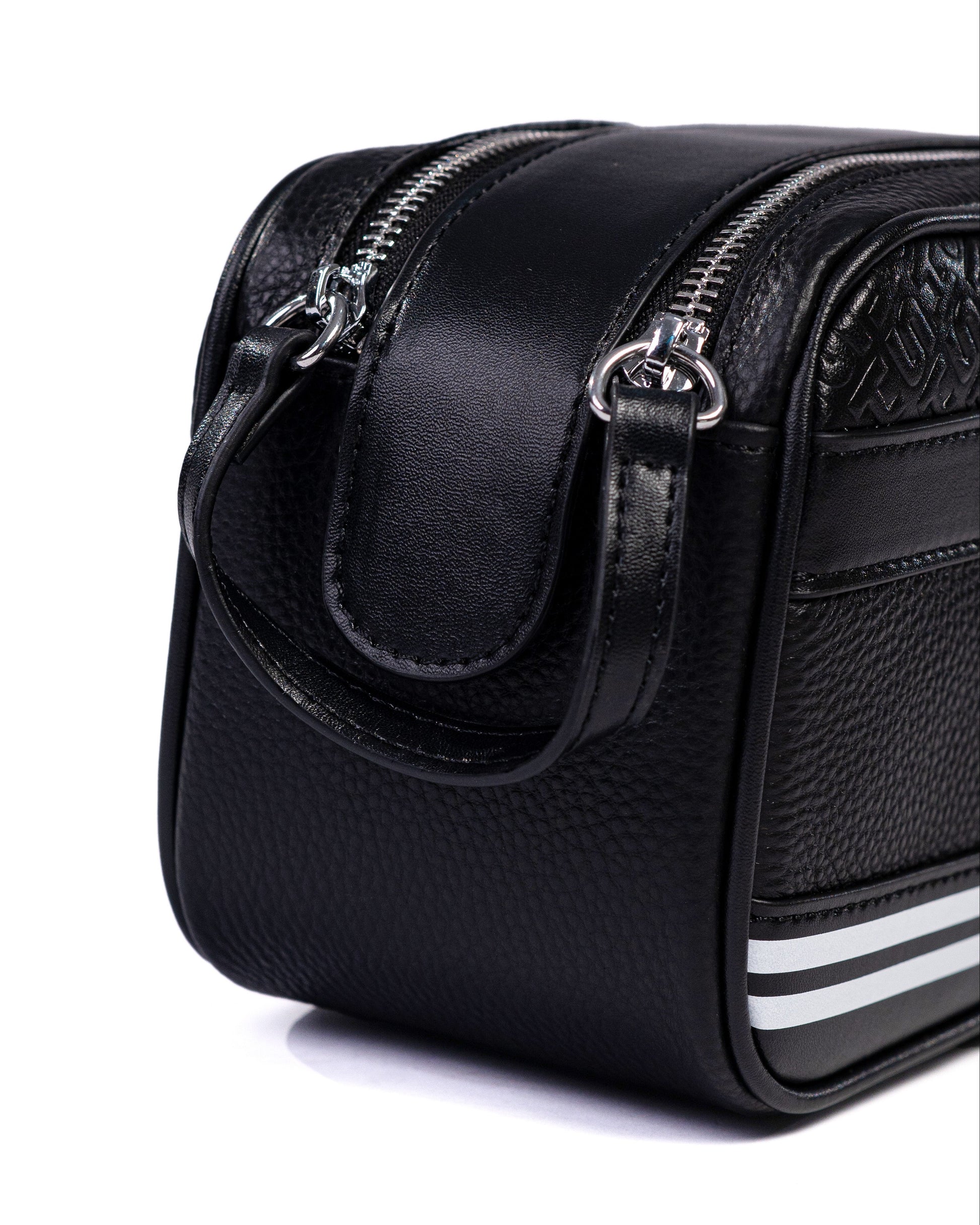 Black leather bag with a handle on a white background