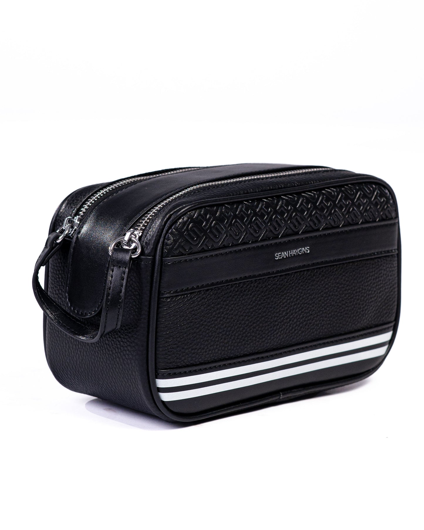 Black toiletry bag with white stripes on a white background