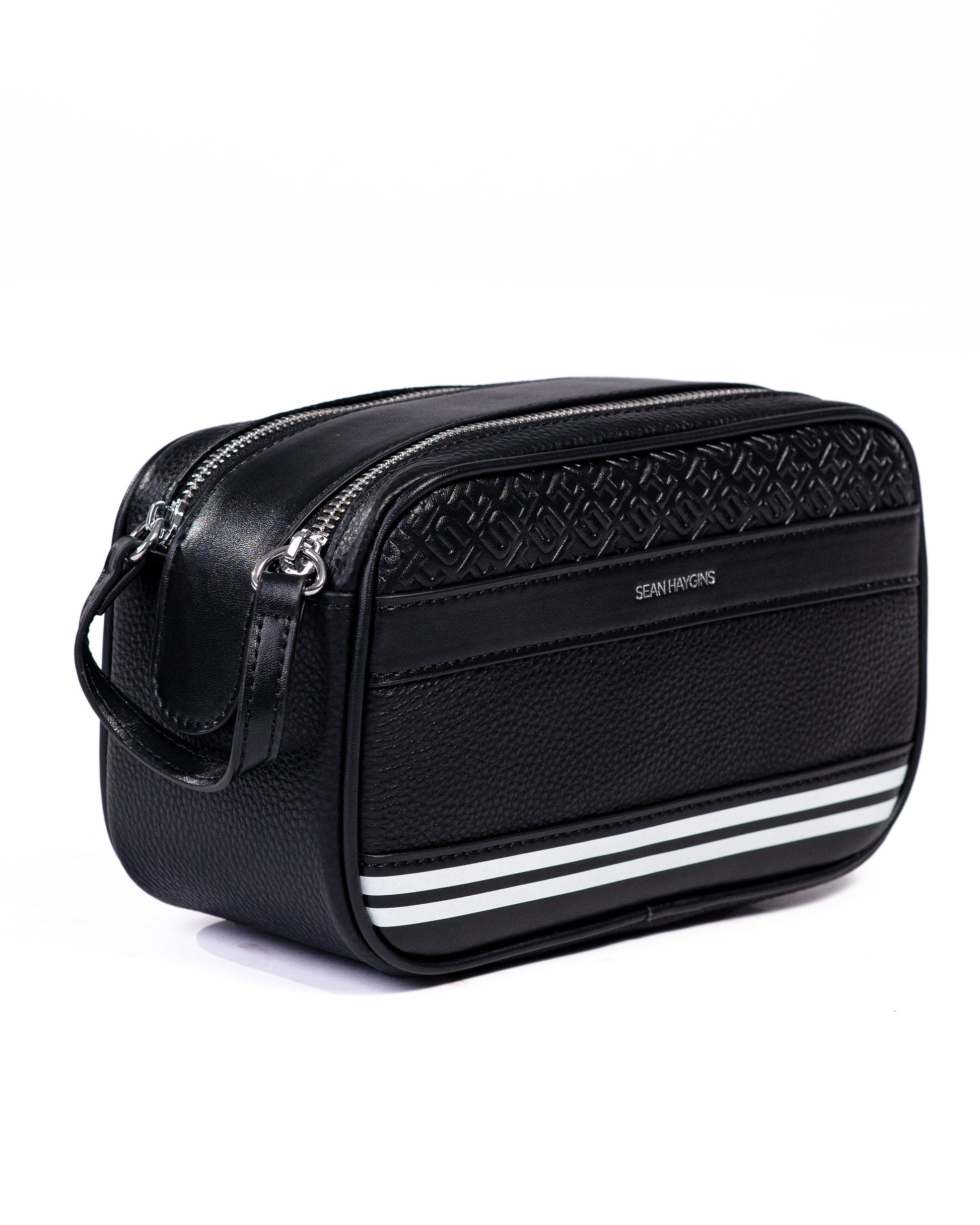 Black toiletry bag with white stripes on a white background