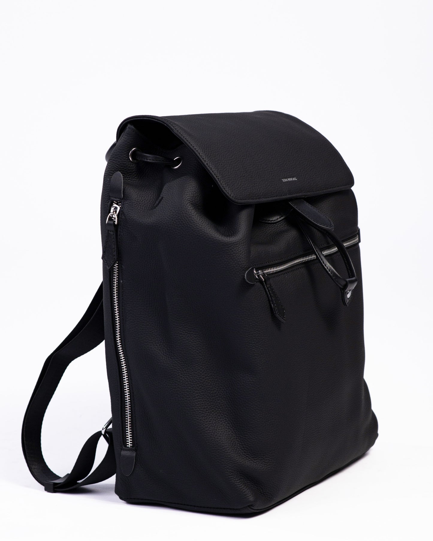 Black backpack on a white background